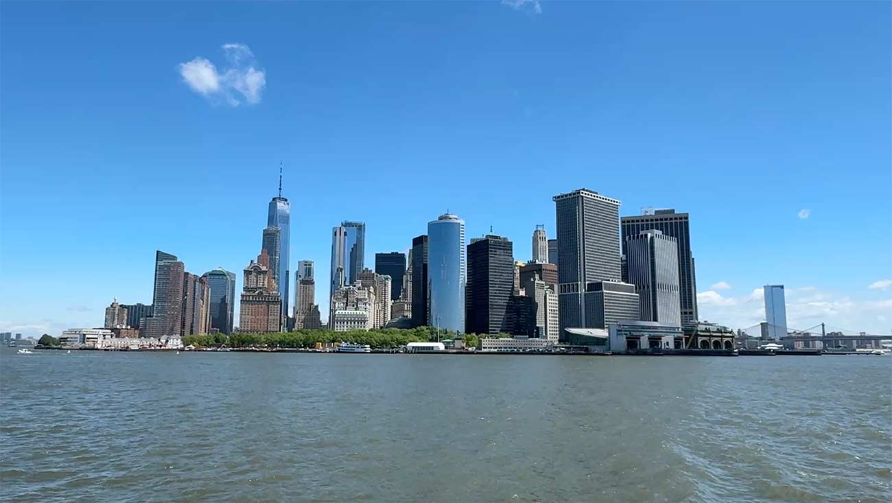 Guests enjoying a New York Harbor cruise with skyline views